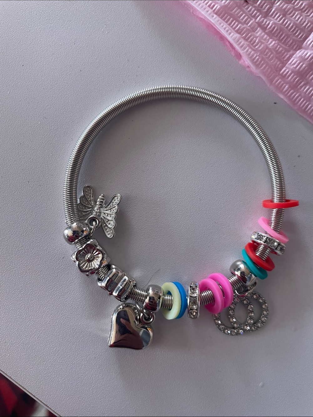 Silver Tone Heart & Charm Bracelet with Pink Accents